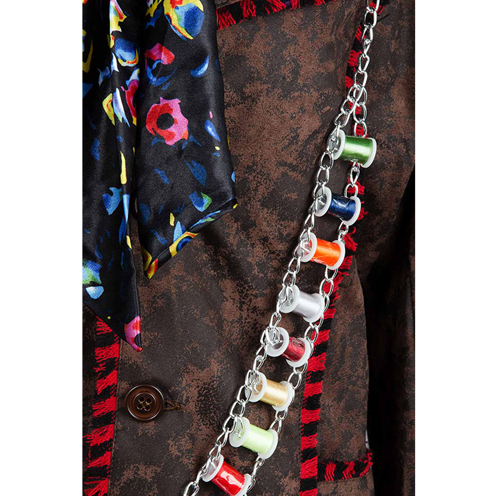 Close-up of patterned jacket and colorful tie from costume set
