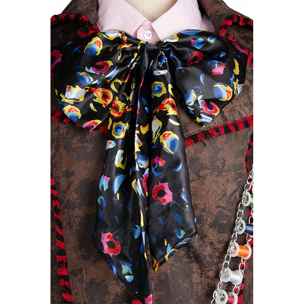 Close-up of patterned jacket and colorful tie from costume set